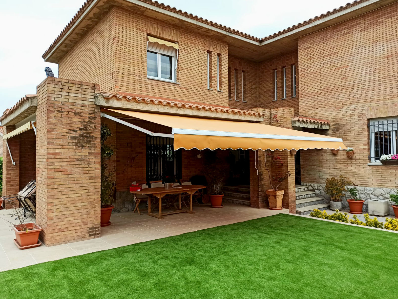 toldo-brazo-articulado-naranja